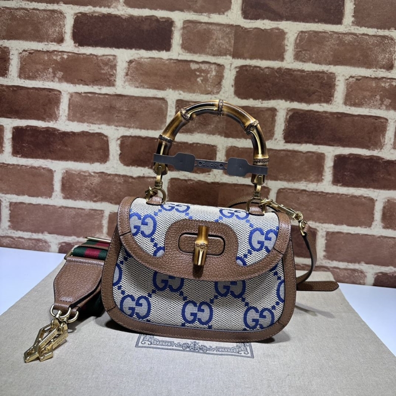 G*u*i top handle bags